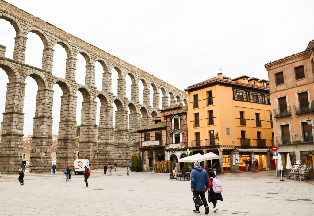 View from the plaza below the roman aqueduct in Segovia, Spain