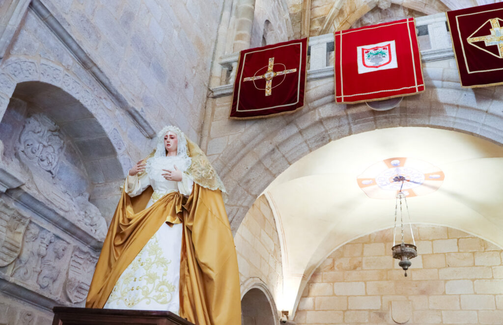 statue of Mary in yellow in cathedral caceres spain