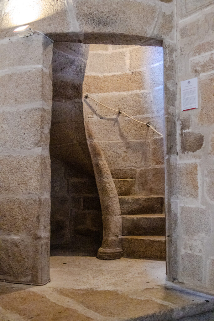 circular stone tower stairs caceres cathedral spain