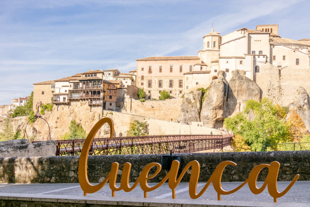 cuenca sign with town of Cuenca spain in the background