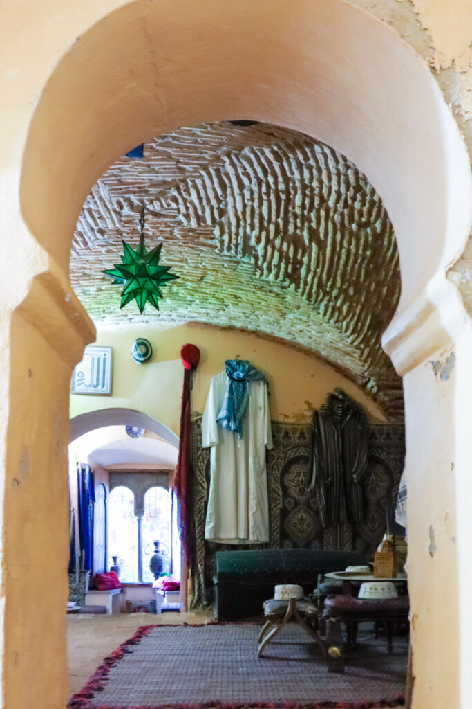 clothing hanging in Arab house in caceres spain seen through an arch