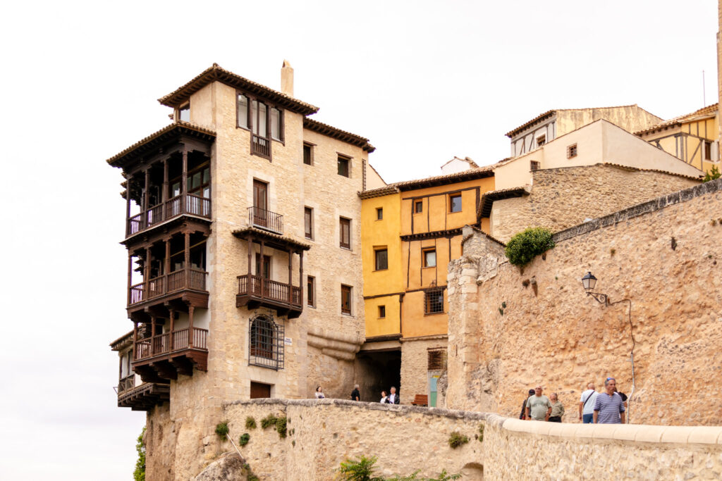 view of hanging houses in Cuenca, spain from the bridge