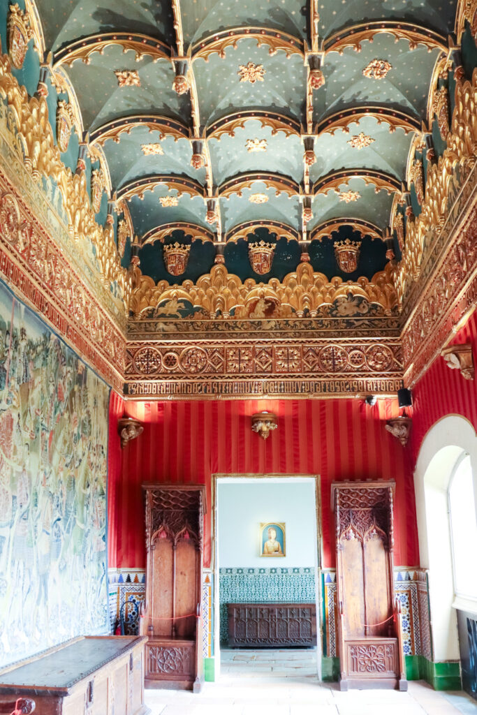 beautiful ceiling and painting through doorway Segovia castle