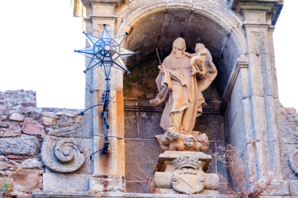 star arch statue and glass star in caceres spain