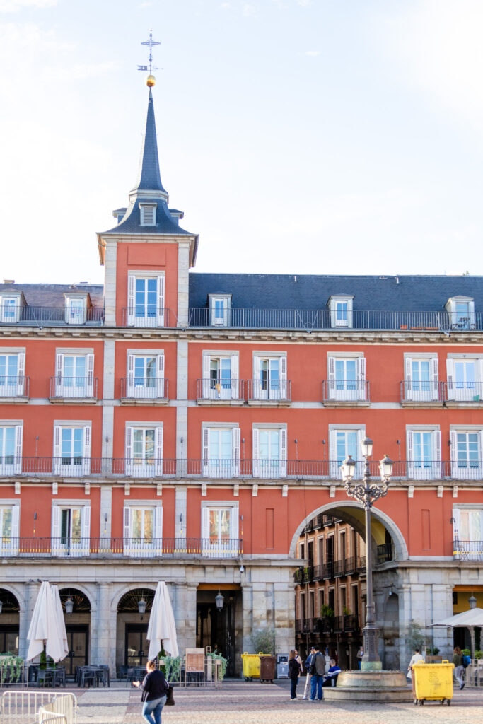 peple walking around plaza mayor in madrid 