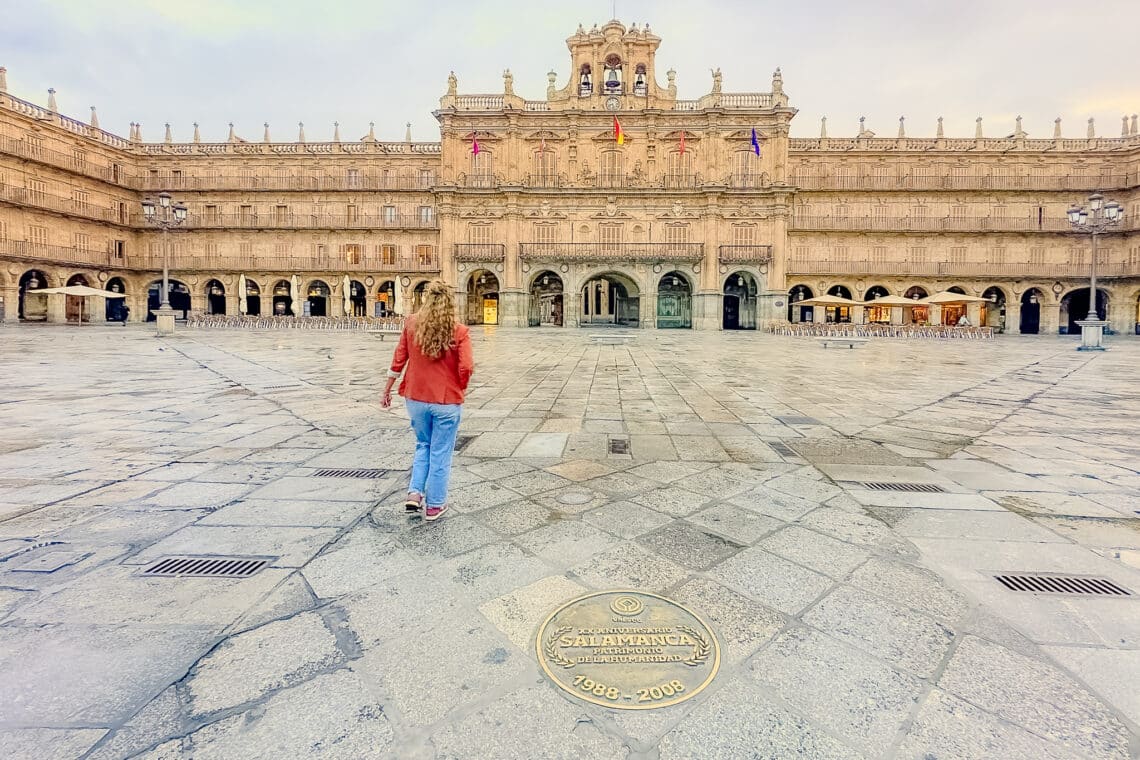 the author maren walking in salamanca spain plaza mayor to show what to pack for spain