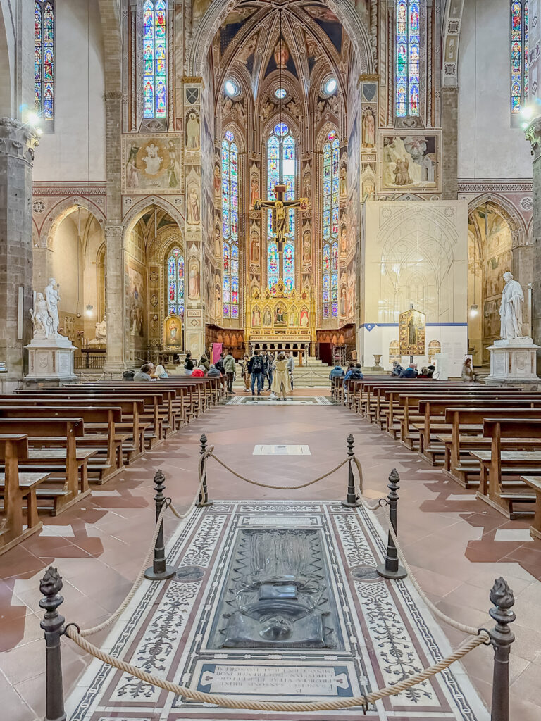 tomb and altar inside santa croce church florence italy