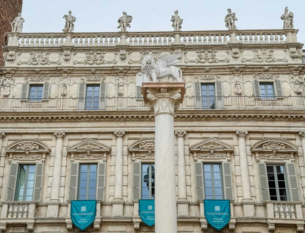 lion statue at the palazzo in piazza erbe Verona italy