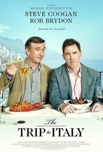 the trip to italy movie poster with two men sitting at a table with Italian food in front of them