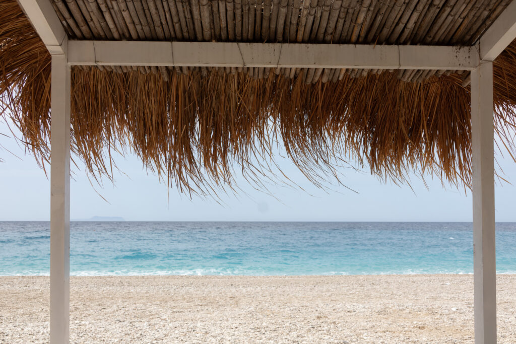 view from a cabana in drymades beach on your Albanian riviera itinerary