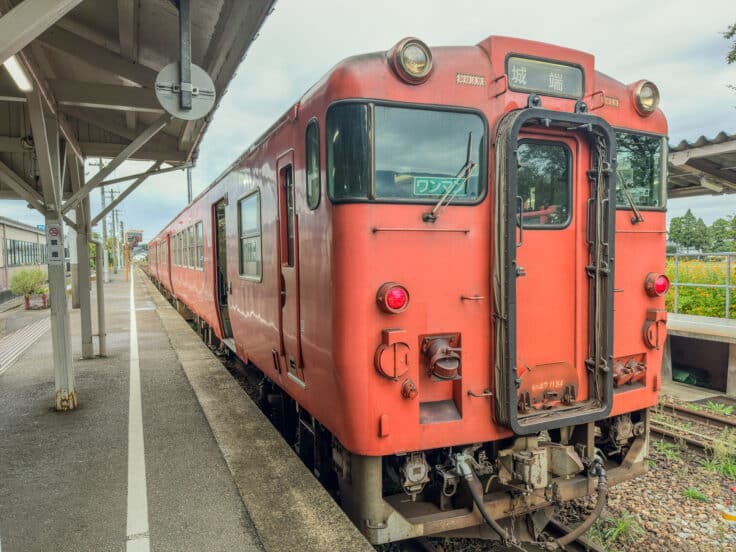 tour Japan by train on a red train to nanto Japan