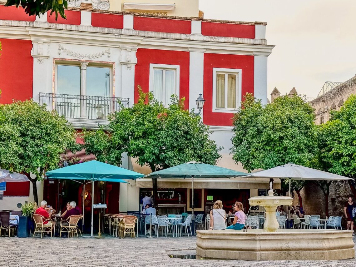 when planning a trip to europe be sure to spend time in plazas like this in seville spain