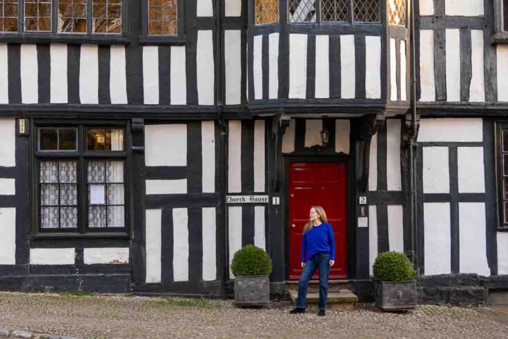 maren trying not to look like a tourist in front of the church house in Ledbury, England